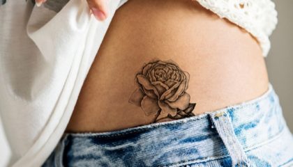 A Close Up Of A Person Wearing A Shirt And Tie