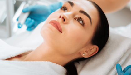 A Woman Lying On A Bed