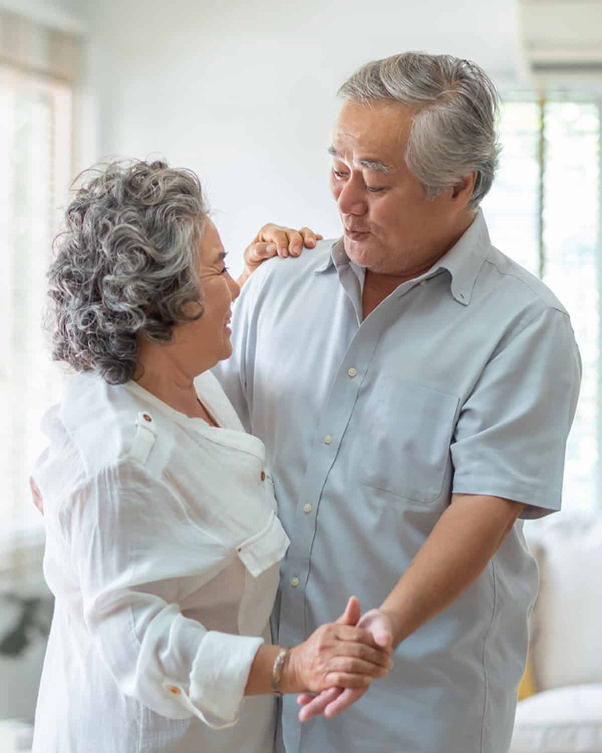 a man dancing with a woman